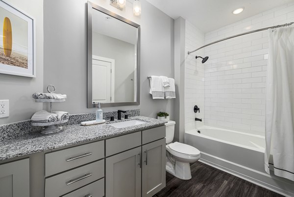 Bathroom with modern fixtures at Element Barclay Station luxury apartments