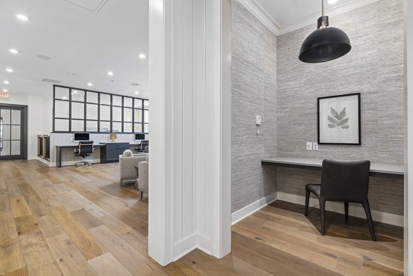 Clubhouse featuring modern design and pool table at Element Barclay Station, luxury apartments by Greystar in Wilmington