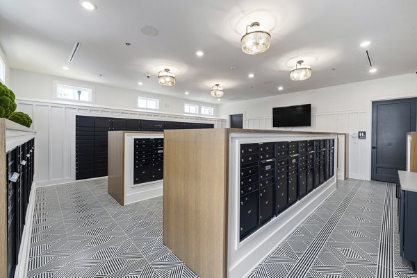 Modern mail room with secure package lockers at Element Barclay Station luxury apartments