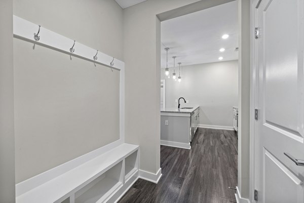 Elegant kitchen with stainless steel appliances in Element Barclay Station luxury apartments