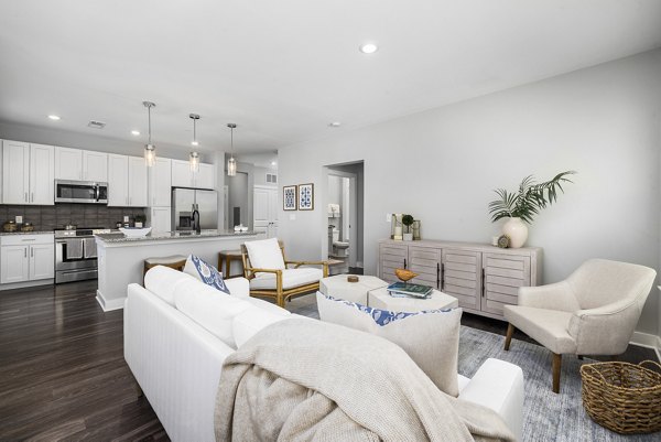 Spacious living room with modern decor in Element Barclay Station, offering luxury apartments by Greystar