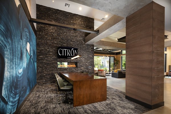 Modern clubhouse with stylish decor at Citron Apartments: luxury living offered by Greystar