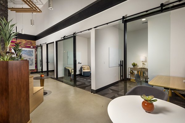 Clubhouse featuring modern decor and seating at Citron Apartments in a Greystar luxury community