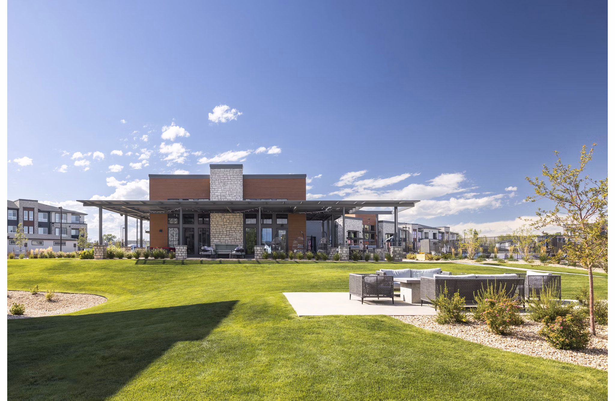 Fieldhouse Apartments: Contemporary outdoor view of luxury property in a vibrant neighborhood