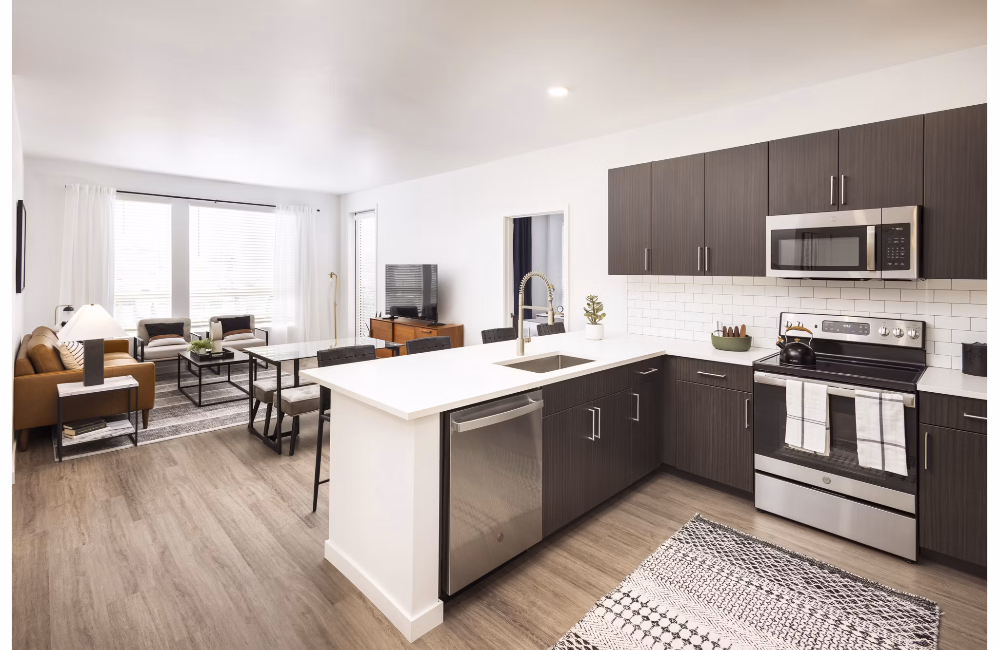 Clubhouse featuring modern seating and entertainment area at Fieldhouse Apartments, a luxury apartment community