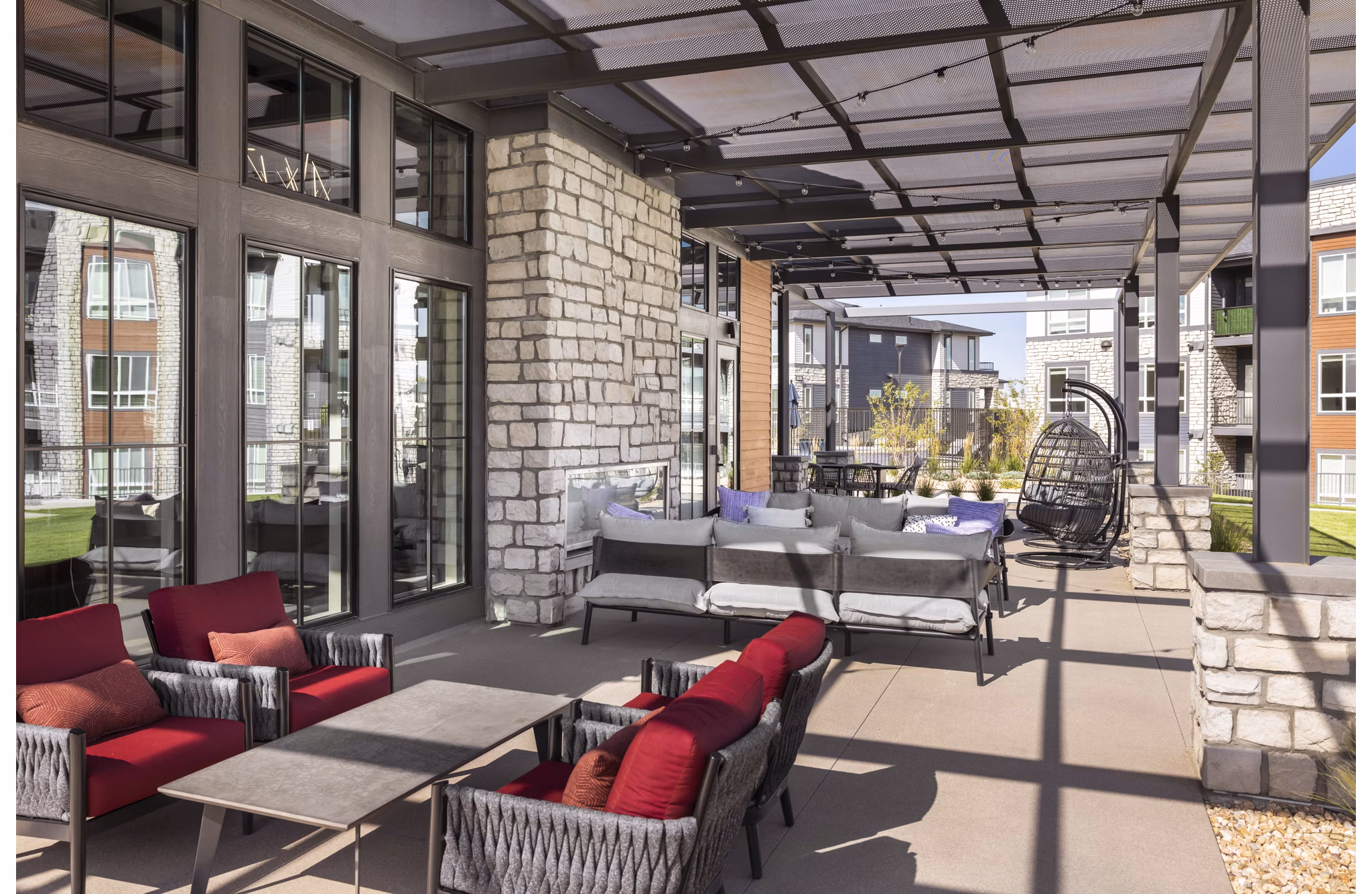 Clubhouse featuring modern design and spacious seating at Fieldhouse Apartments