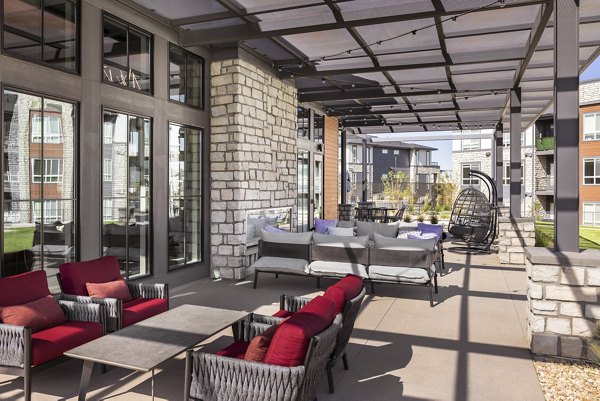 Clubhouse featuring modern design and spacious seating at Fieldhouse Apartments