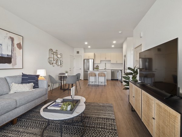 Clubhouse with modern decor and seating at Fieldhouse Apartments, a luxury living community