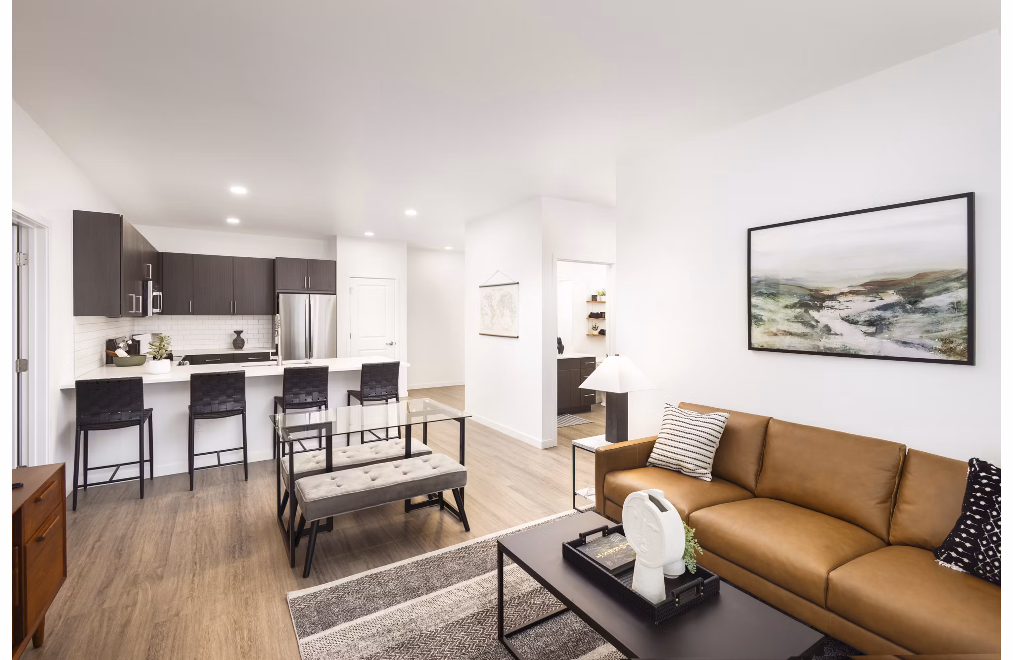 Clubhouse featuring modern design and ample seating at Fieldhouse Apartments, a luxury community by Greystar
