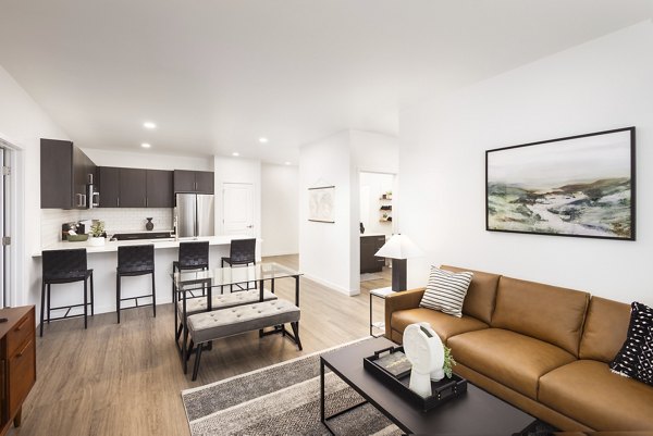 Clubhouse featuring modern design and ample seating at Fieldhouse Apartments, a luxury community by Greystar