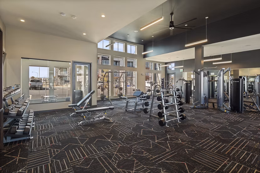 Fitness center with modern equipment at Fieldhouse Apartments, a luxury community offering premier wellness amenities