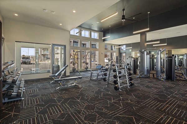 Fitness center with modern equipment at Fieldhouse Apartments, a luxury community offering premier wellness amenities