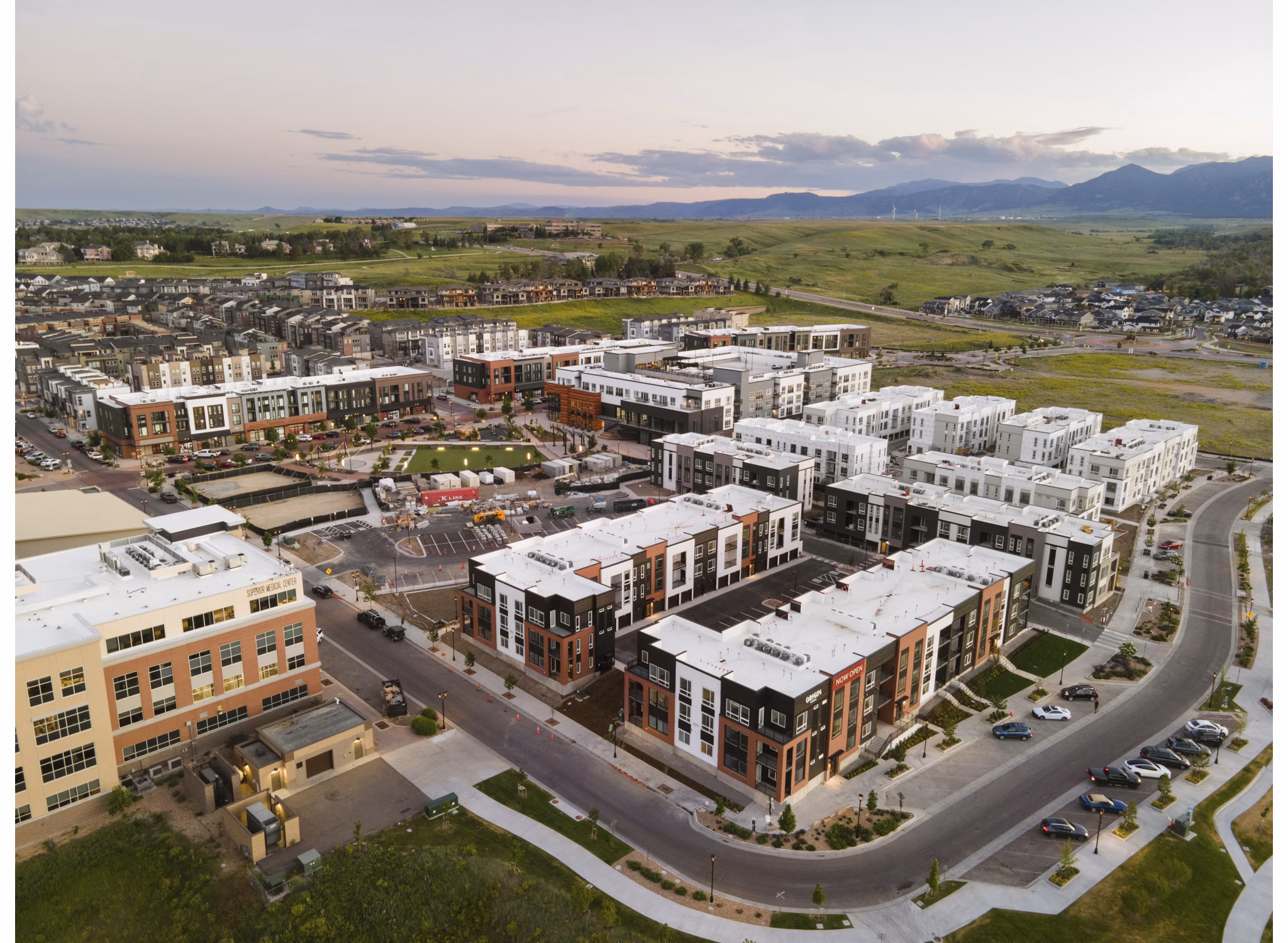 Origin Apartments: Sleek modern of luxury apartment complex in urban setting