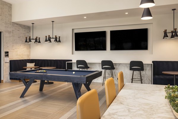 Clubhouse featuring modern design and cozy seating at Origin Apartments in downtown Seattle