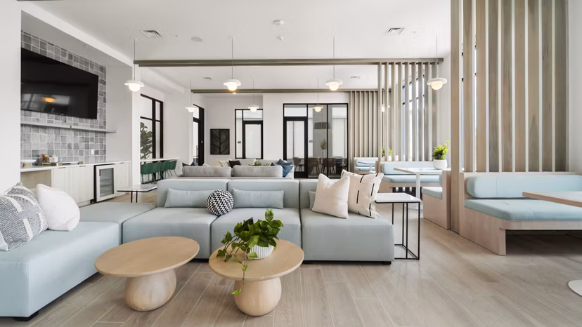 Clubhouse featuring modern design and communal spaces at Infield Apartments