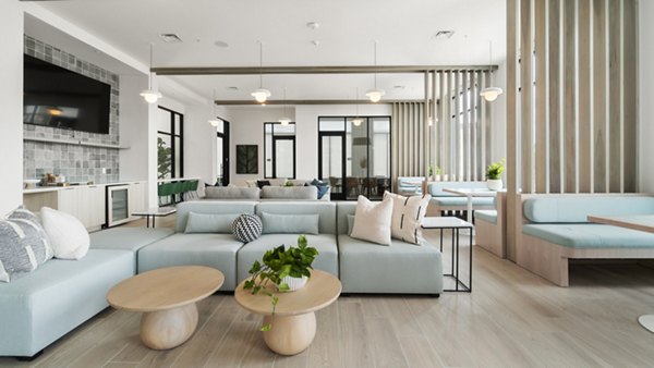 Clubhouse featuring modern design and communal spaces at Infield Apartments