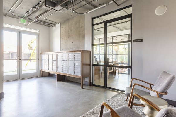 Mail room featuring organized parcel lockers at The LC Apartments