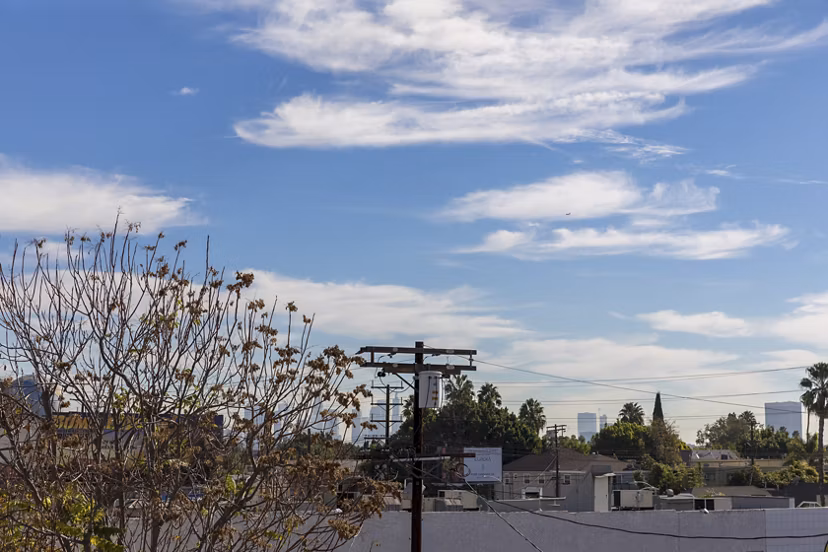 The LC Apartments: Scenic view from modern luxury apartments in the heart of an urban environment