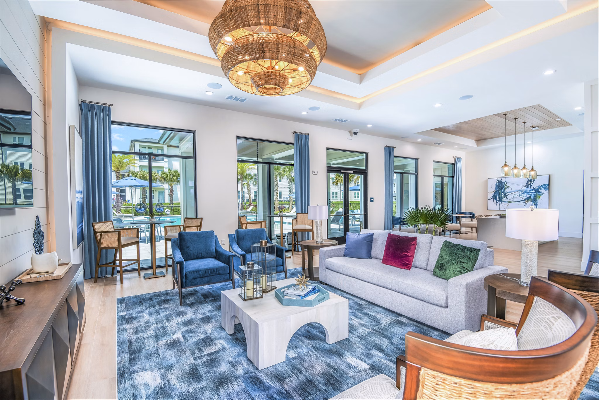 Stylish clubhouse at Ltd Champions Ridge Apartments featuring cozy seating and modern decor