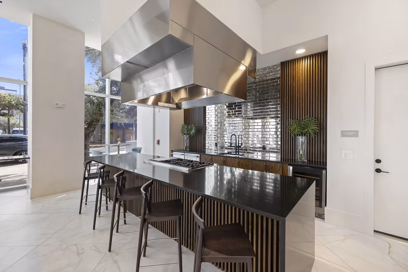 Clubhouse featuring modern decor and seating at Elev8 Apartments