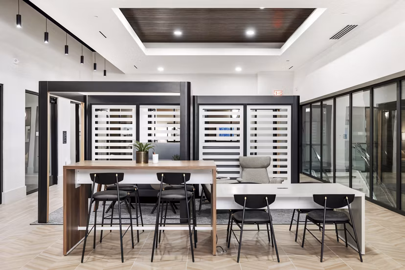 Modern clubhouse featuring open seating and games at Elev8 Apartments in luxury housing community