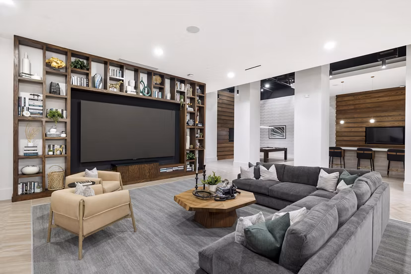 Clubhouse featuring modern design and spacious seating area at Elev8 Apartments, perfect for social gatherings and events