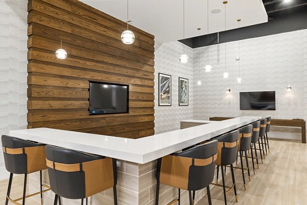 Stylish clubhouse with modern seating and amenities at Elev8 Apartments, perfect for socializing and relaxation