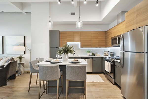 Contemporary dining area with sleek furnishings at Elev8 Apartments, ideal for socializing and entertaining