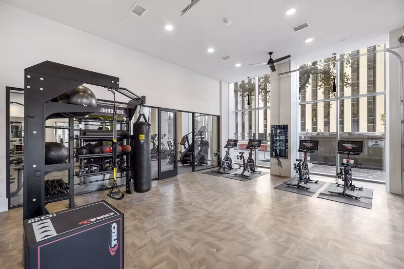 Modern fitness center with state-of-the-art equipment at Elev8 Apartments, perfect for active residents seeking a healthy lifestyle