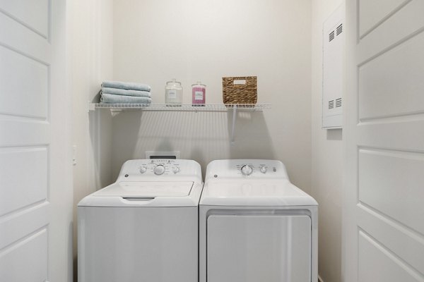 laundry room at Elev8 Apartments