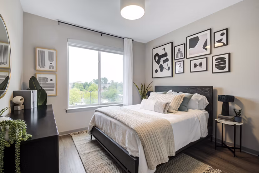 Spacious bedroom featuring modern decor at Vista Fairfax Corner Apartments