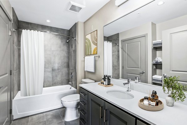 Modern bathroom with sleek fixtures at Vista Fairfax Corner Apartments