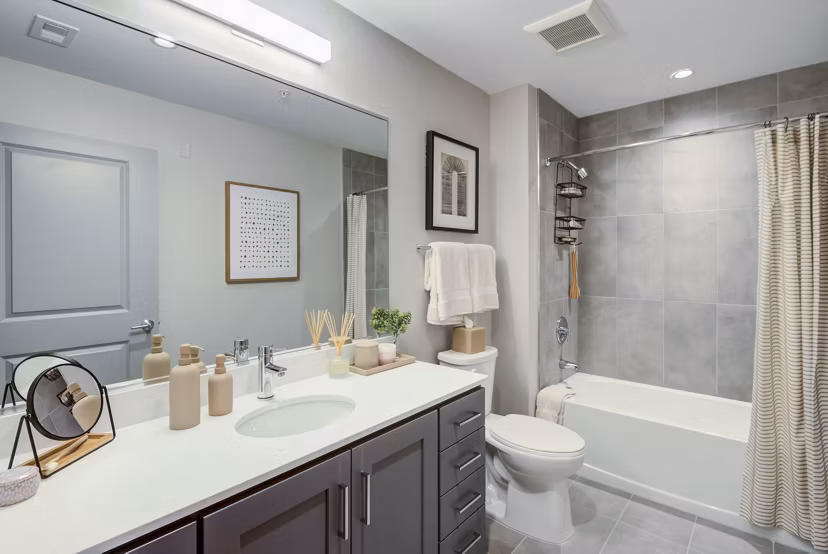 Modern bathroom with sleek fixtures in Vista Fairfax Corner Apartments