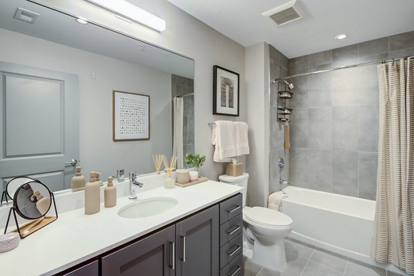 Modern bathroom with sleek fixtures in Vista Fairfax Corner Apartments