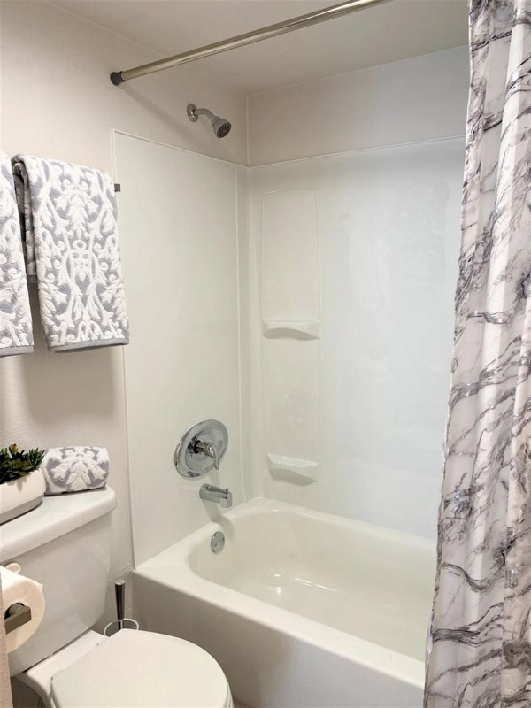Elegant bathroom featuring modern fixtures at Seventh Apartments