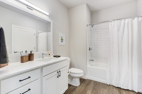 Modern bathroom with sleek finishes at DASH Downers Grove Apartments