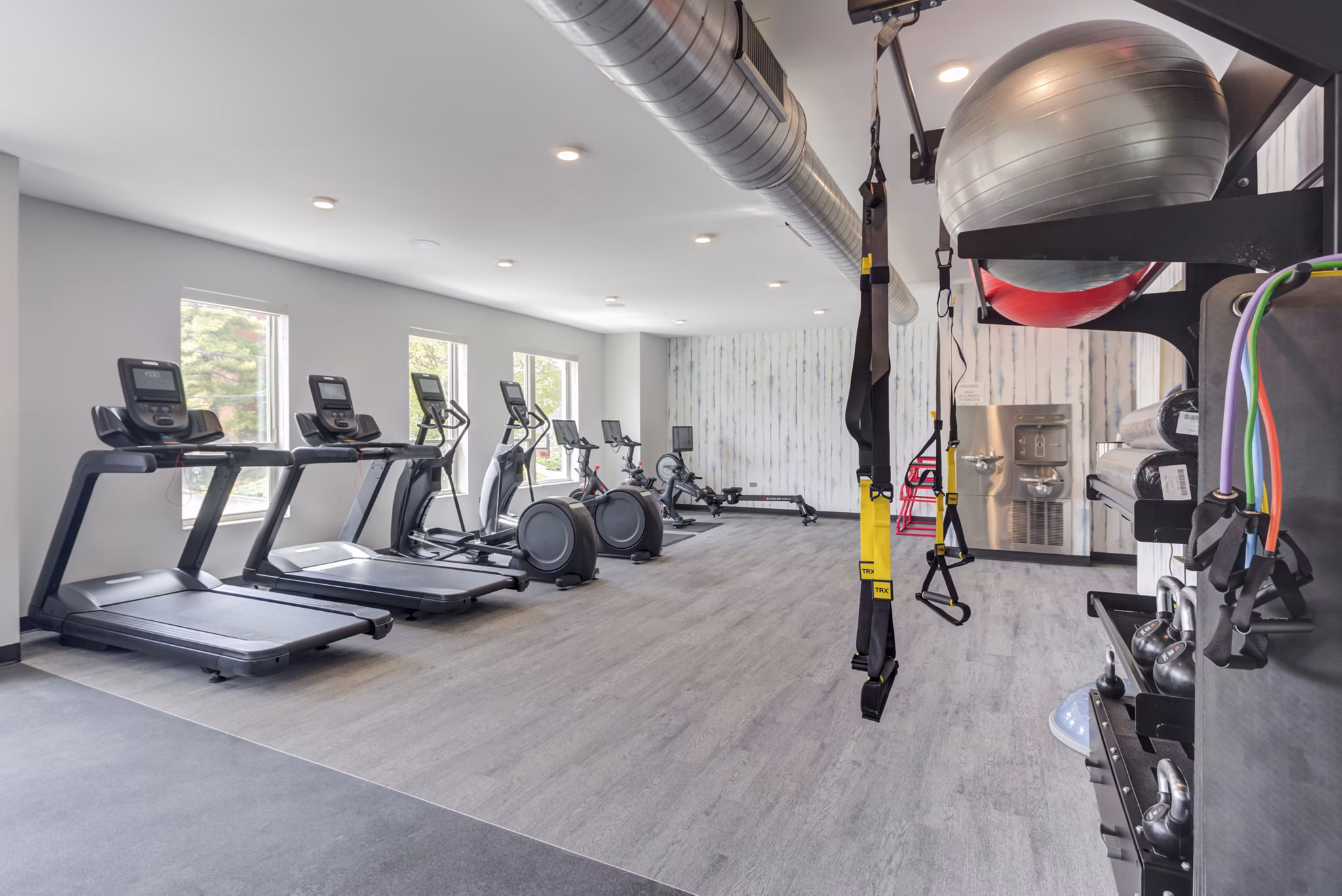 State-of-the-art fitness center with modern equipment at DASH Downers Grove Apartments
