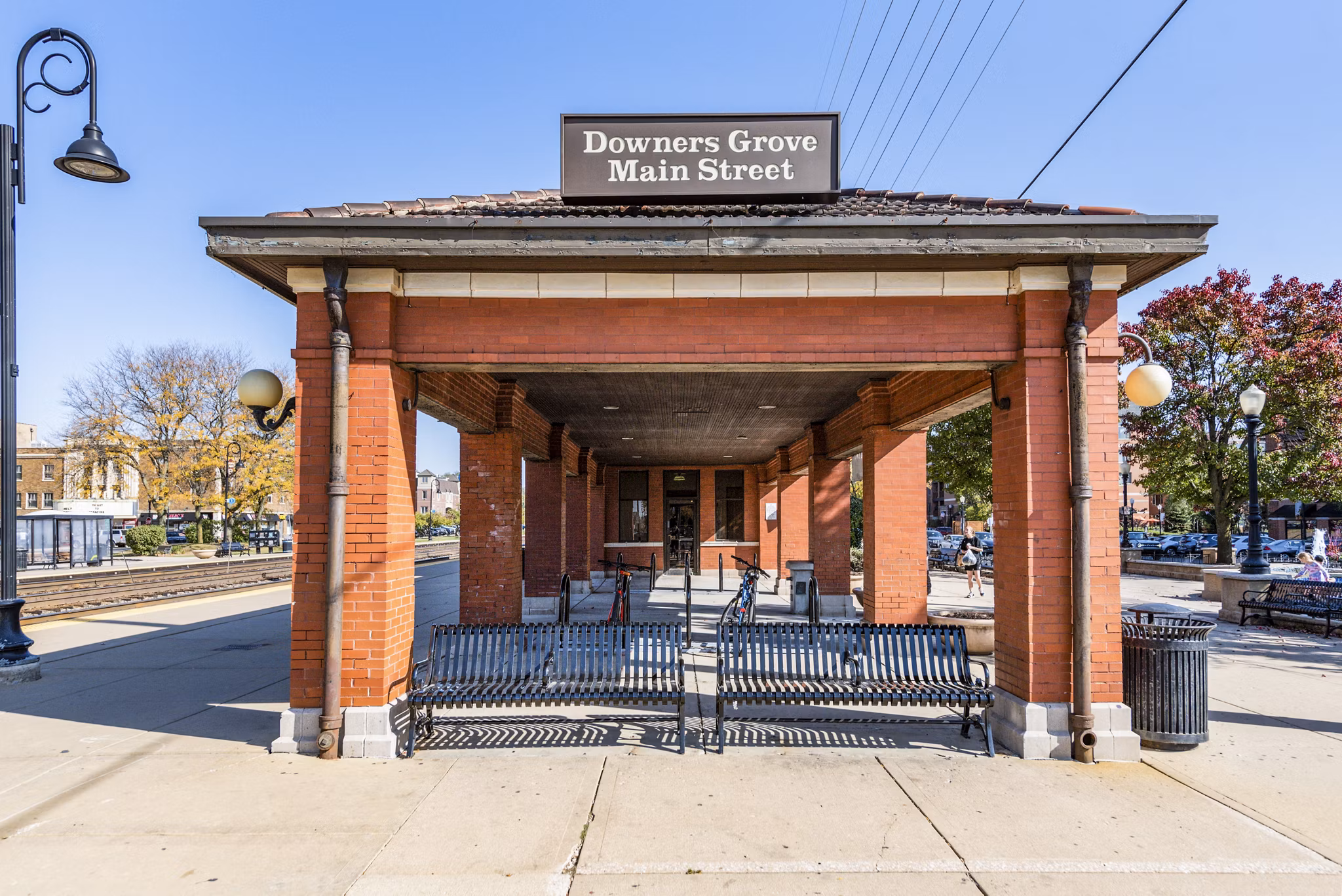 Charming neighborhood view at DASH Downers Grove Apartments featuring tree-lined streets and cozy ambiance