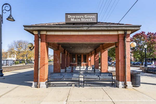 Charming neighborhood view at DASH Downers Grove Apartments featuring tree-lined streets and cozy ambiance