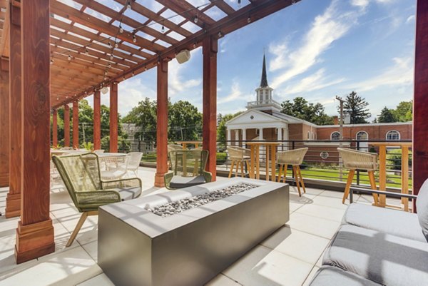 Cozy fire pit at DASH Downers Grove Apartments' outdoor lounge