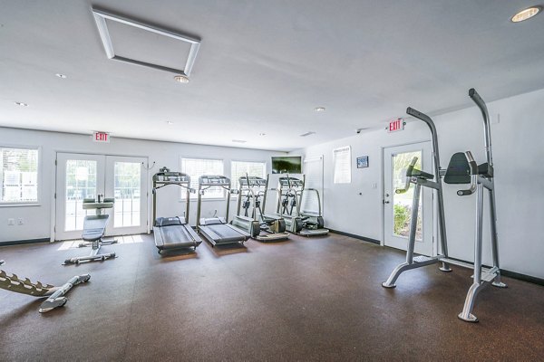 State-of-the-art fitness center with modern equipment at Woodshire Apartments
