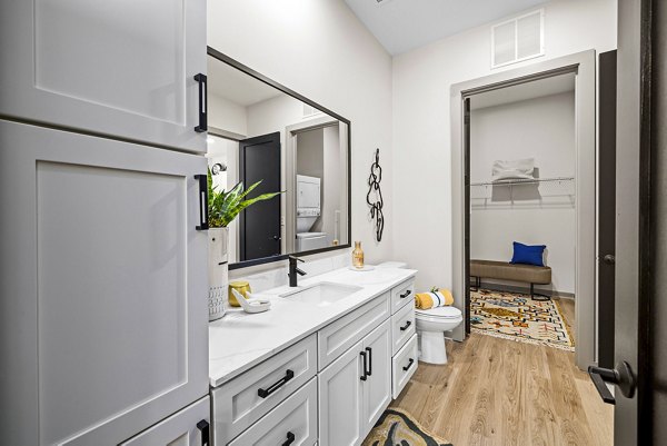 Modern bathroom with sleek fixtures at The Artreaux Apartments, ideal for luxury living in a Greystar community