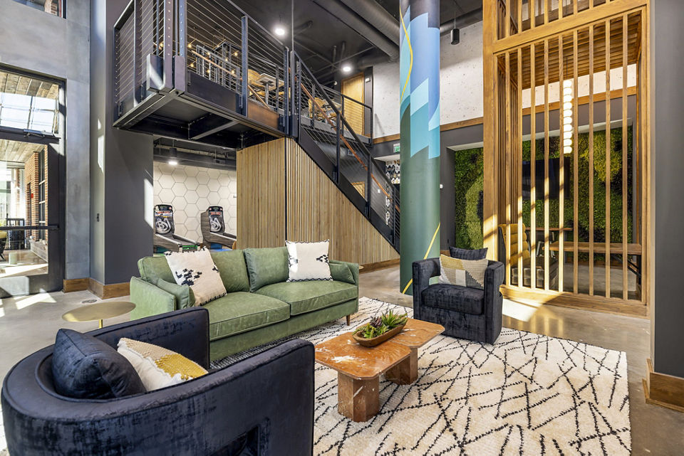 Clubhouse featuring modern design and vibrant art at The Artreaux Apartments