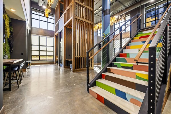 Clubhouse featuring modern design and art installations at The Artreaux Apartments