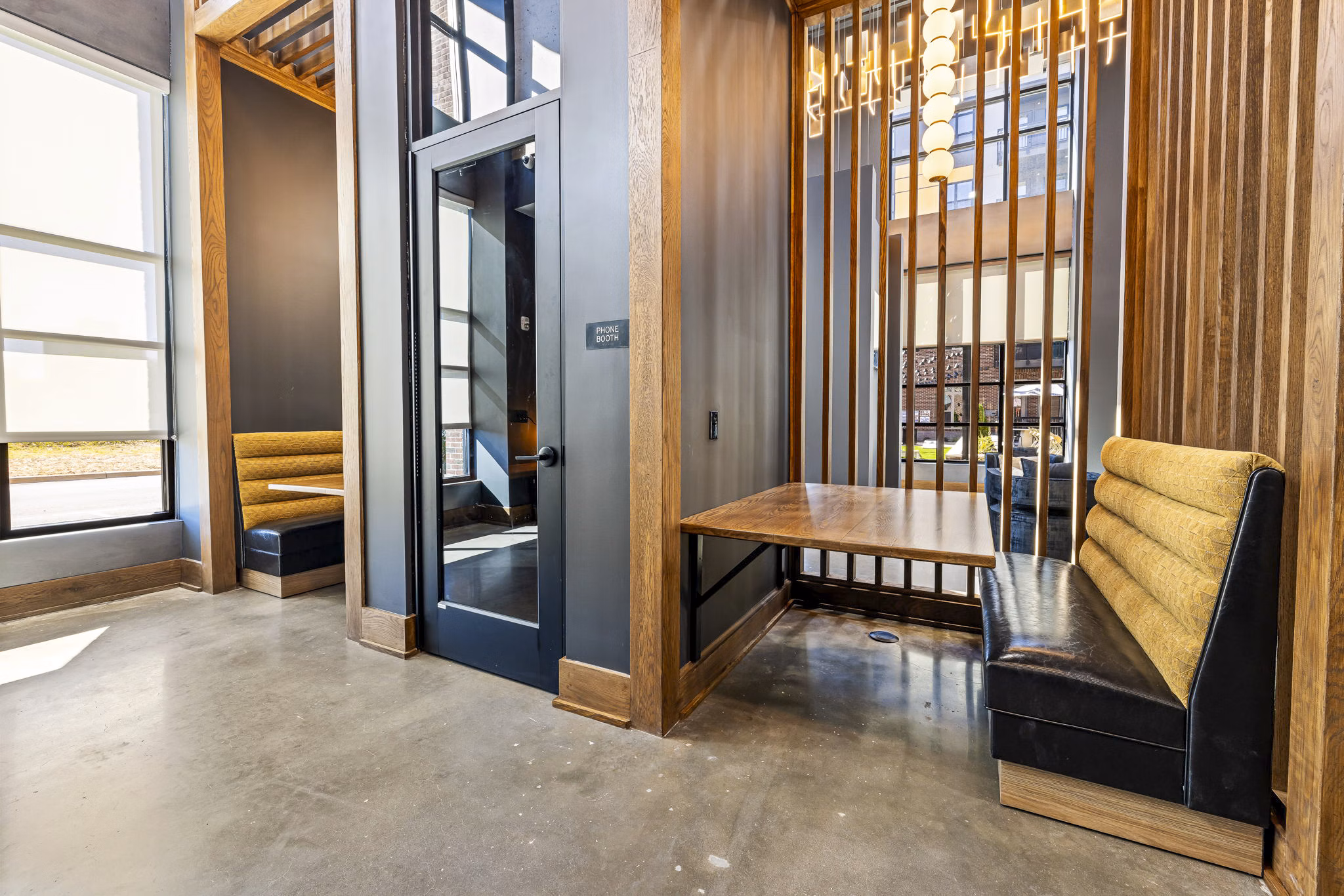 Modern clubhouse with art displays at The Artreaux Apartments: luxury community living