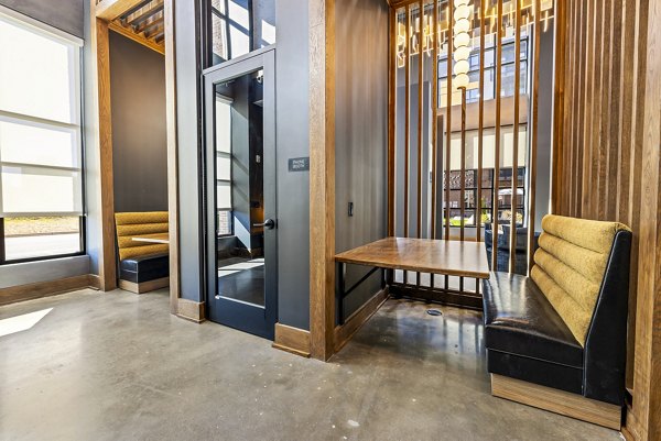 Modern clubhouse with art displays at The Artreaux Apartments: luxury community living