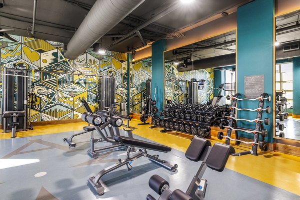 The Artreaux Apartments: Modern fitness center with state-of-the-art equipment and spacious design