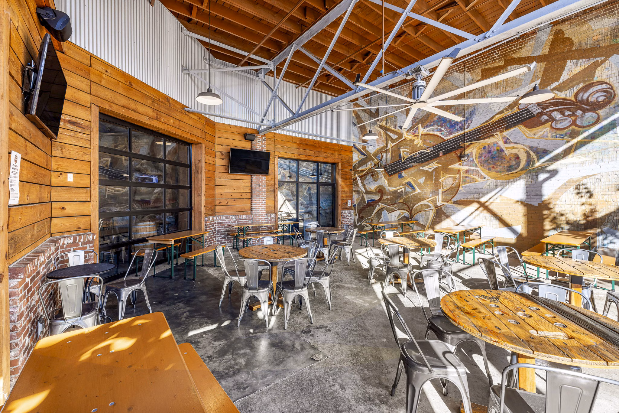 Charming neighborhood at The Artreaux Apartments: Tree-lined streets and local shops