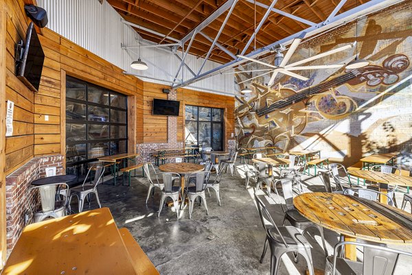 Charming neighborhood at The Artreaux Apartments: Tree-lined streets and local shops
