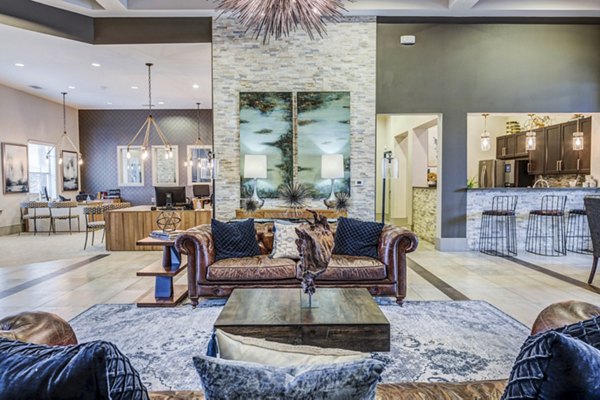 Modern clubhouse and stylish lobby at Harlow Spring Cypress Apartments featuring elegant seating areas and contemporary decor